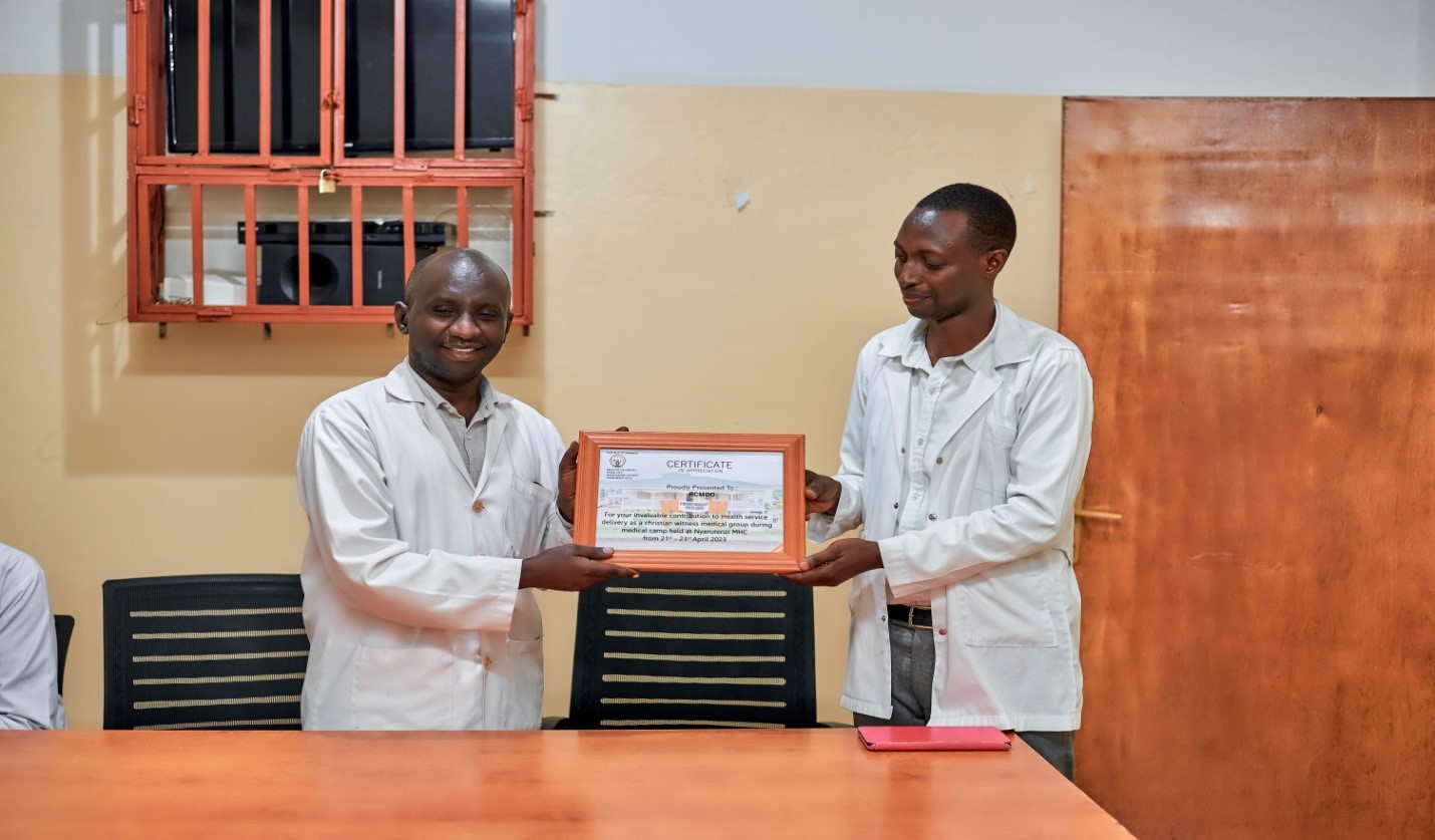 RCMDO WAS GIVEN A CERTIFICATE OF APPRECIATION FOR A SUCCESSFUL MEDICAL CAMP AT NYARUYENZI HEALTH CENTER